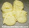Yellow newborn baby booties